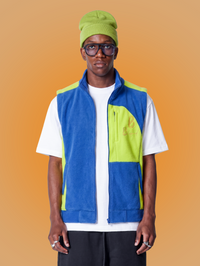 Blue and lime Bledlard fleece vest on male model — front view