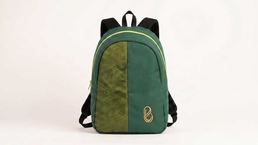 Forest green 24-litre waxed canvas Bledlard backpack — front view